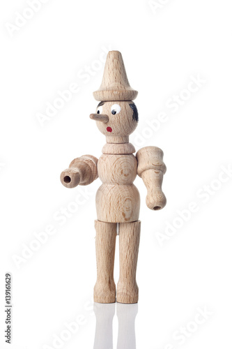 Wooden Pinocchio doll isolated on white background.
