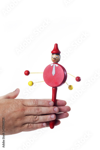 Wooden Pinocchio doll isolated on white background.