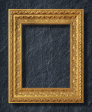 Fototapeta  - gold frame on black slate background