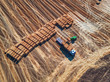 Aerial view of harvest field and hay bales