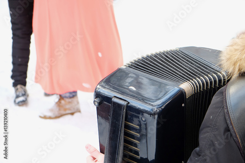 Fotomural accordionist during the traditional Russian celebration