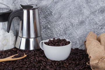 Canvas Print - coffee beans in cup with geyser coffee maker