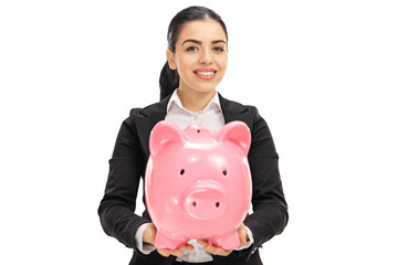 Poster - Happy businesswoman holding a piggybank