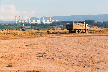 Part of a pit with big mining truck working