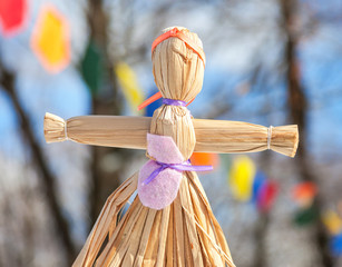 Traditional handmade straw doll gift on the Shrovetide carnival