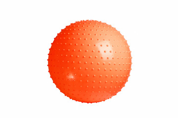 Wall Mural - Close up of an orange fitness ball isolated on white background