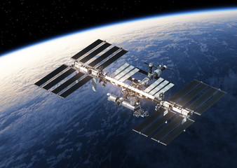 Wall Mural - international space station orbiting earth