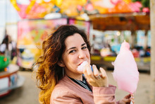 Woman With Cotton Candy In The Park