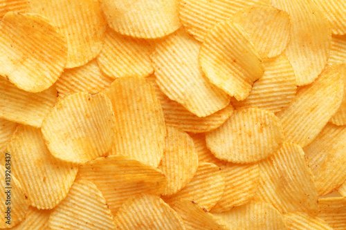 Fotografía background corrugated golden chips with texture