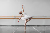Female ballet dancer keep the rack in class