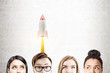 © ImageFlow - Business team and rocket, concrete
