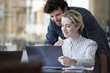 © PhotoAlto - Couple using laptop computer together