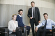 © PhotoAlto - Portrait of smiling business team members