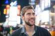 © PhotoAlto - Young man amazed by his surroundings, Times Square, New York City, New York, USA