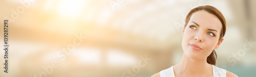 Fotomural Contemplative Young Adult Woman Looking Off To The Side with Room For Text