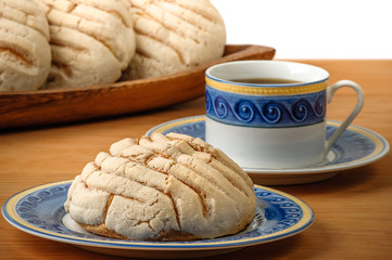 Mexican Conchas sweet bread with coffee cup