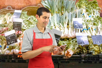 greengrocer using smartphone