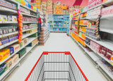 Fototapeta  - Abstract blurred photo of store with trolley in department store background