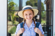 © GeeVee - high school student with hat and backpack