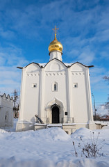 Wall Mural - White Vvedensky church with golden dome in Sergiev Posad in winter, Russia