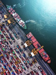 Canvas Print - container ship in import export and business logistic.By crane ,Trade Port , Shipping.cargo to harbor.Aerial view.Water transport.International.Shell Marine.Top view.