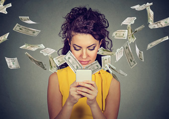 woman using smartphone making money