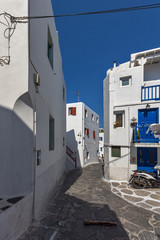 Street with white houses in town of Mykonos, Cyclades Islands, Greece