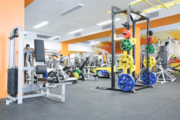 Wall Mural - Exercise equipment in modern gym