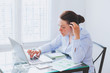 © Song_about_summer - business woman working on computer in modern office