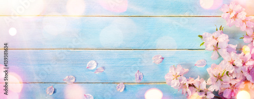 Almond Blossom On Blue Wooden Table