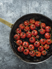 Wall Mural - rustic roasted red summer cherry tomato