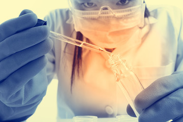 scientist with equipment and science experiments