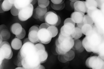 Wall Mural - black abstract blurred bokeh for background and design, defocused.