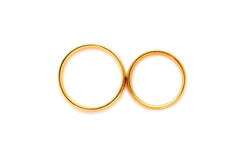 Golden wedding rings isolated on a white