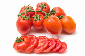 Wall Mural - Close up red cherry tomato on white background isolated.