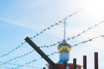 Church behind barbed wire