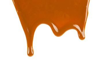 Caramel sauce isolated on a white background