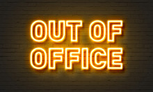 Out of office neon sign on brick wall background.