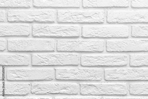 Fototapeta na wymiar Abstract weathered texture stained old stucco light gray white brick wall background, grungy blocks of stonework technology color horizontal architecture wallpaper