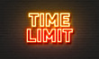 Time limit neon sign on brick wall background.