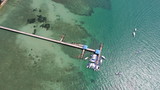 Fototapeta Łazienka - Aerial drone photo of pier on Rawai beach in Phuket, Thailand