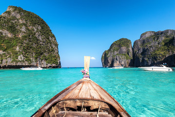 Wall Mural - Amzing view from over longtail boat Travel vacation background - Beautiful sea tropical island and sky of Maya bay - Phi-Phi island, Krabi Province, Thailand.