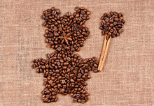 Shape Of Bear Made Of Coffee Beans On Burlap