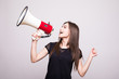 © F8  \ Suport Ukraine - Pretty girl shouting into megaphone on copy space