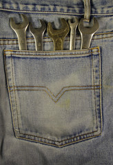 Wall Mural - Wrench tools in the pocket jeans