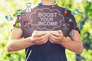 Sticker - Boost Your Income concept with young man holding his smartphone