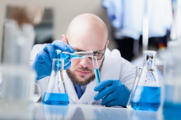 Man researcher carrying out scientific research.