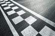 canvas print picture - Sunny finish and start pattern line on the asphalt race road.