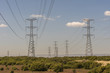 Electricity supply towers and structures transmit power along high voltage wires and cables