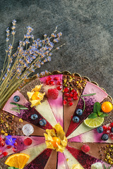 Wall Mural - raw vegan cake with fruits and seeds, decorated with flowers, product photography for patisserie